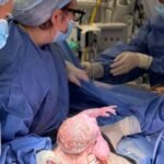 A baby boy named Hugo Powell has become the first child born in Britain to a mother who received a womb transplanted from a deceased donor, a breakthrough announced February 24, 2026, that offers new hope to women born without a viable uterus.